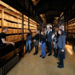 Long view of Arts end with group and guide